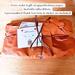 Pictured is a gift-wrapped item in copper colored tissue paper and tied with raffia. A personalized Thank You Note & sticker are included.